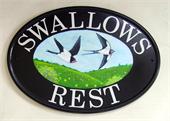 house-plaque-swallows-motif